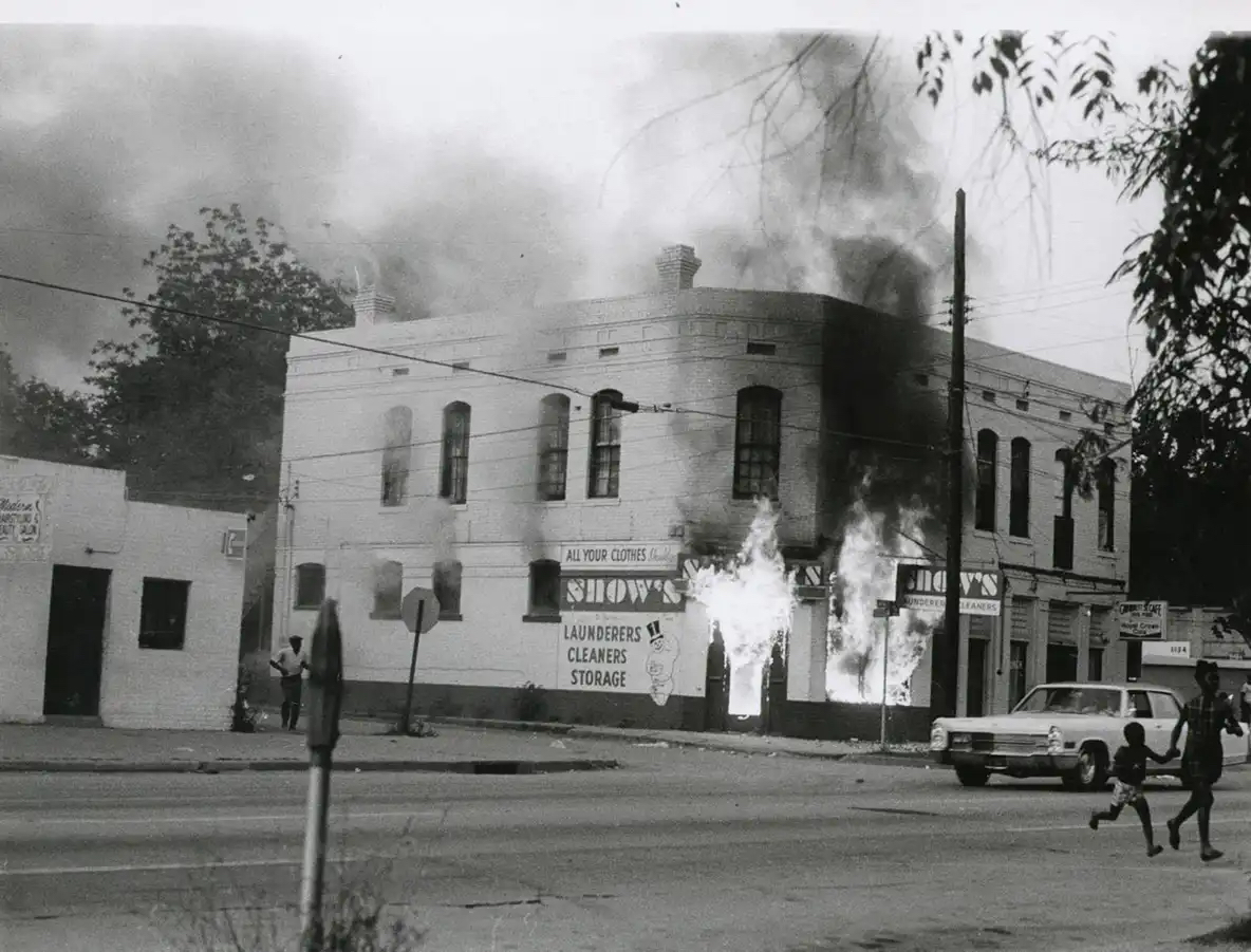 Protestors set a laundromat on fire at during the Augusta Riot